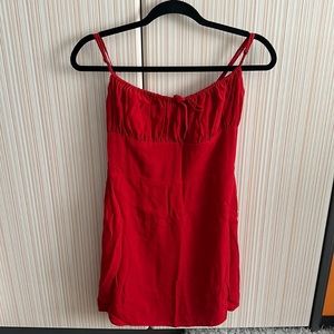 aritzia dress. when put on it hugs your waste in! very light material. supercute